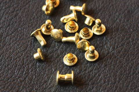 1.000 Doppelkopfhohlnieten 7/8 Gold 379